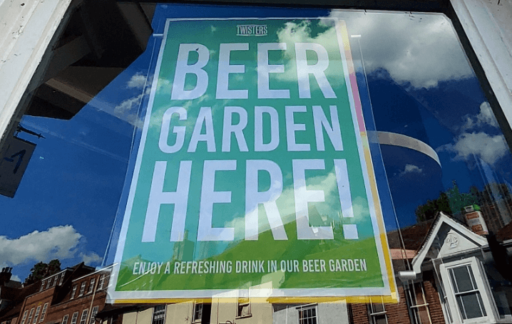 A sign for Twisters Beer Garden
